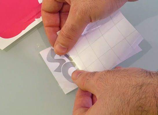 Applying the paper-based sign vinyl application tape